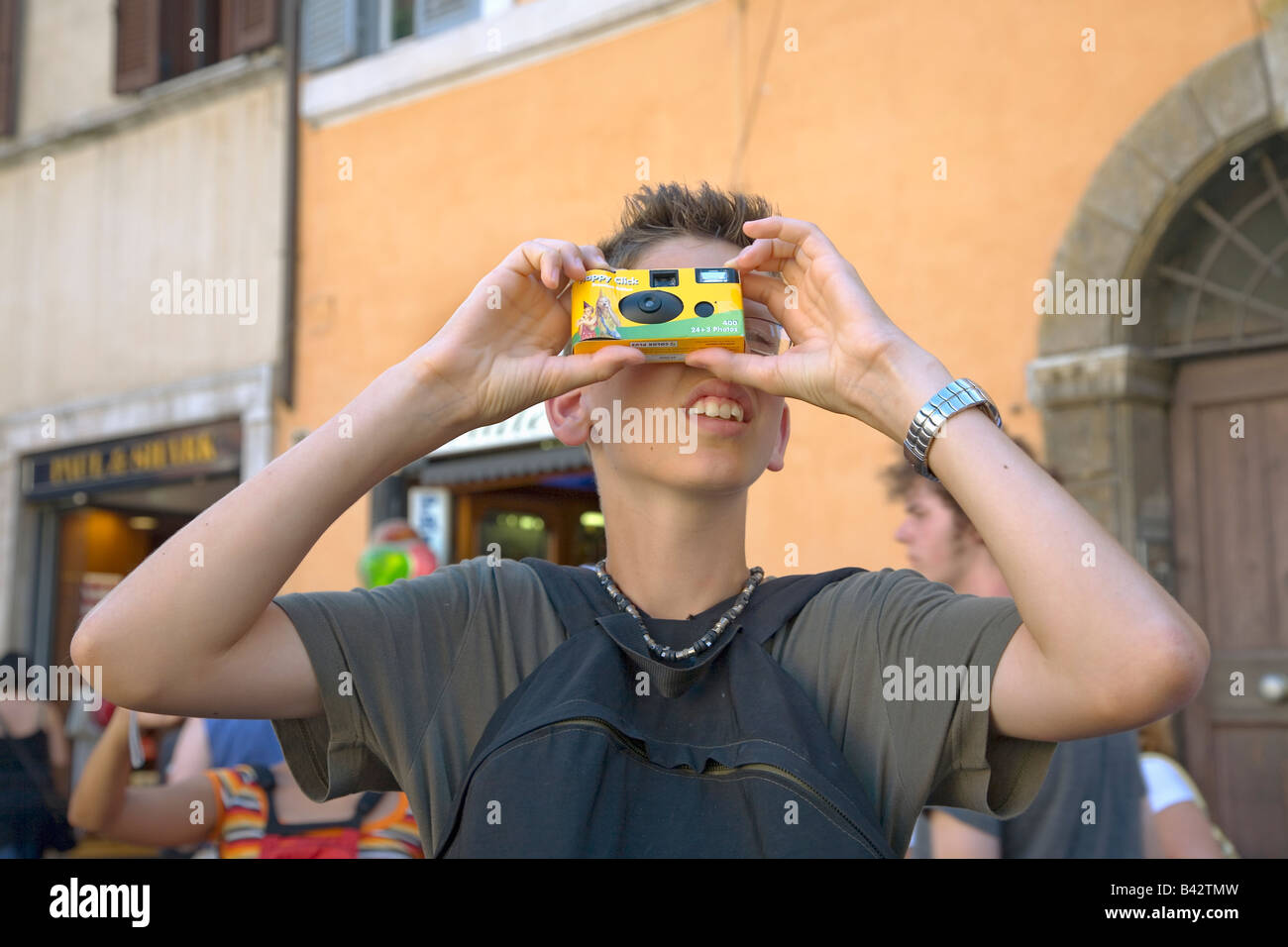 Photographer shooting disposable camera in Rome, Italy Stock Photo Alamy