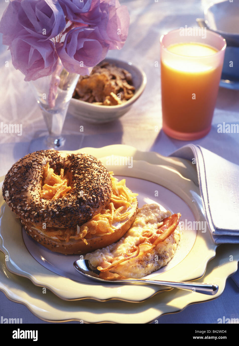 Scrambled eggs with bacon and cheese bread bun Stock Photo - Alamy