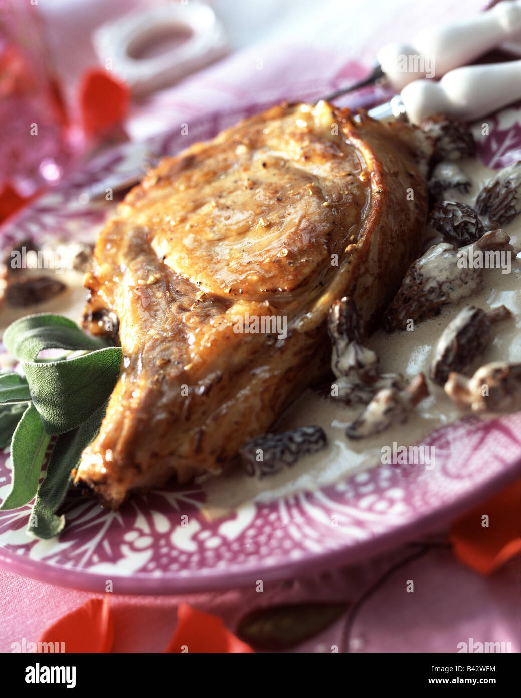 Veal chop with morels Stock Photo Alamy