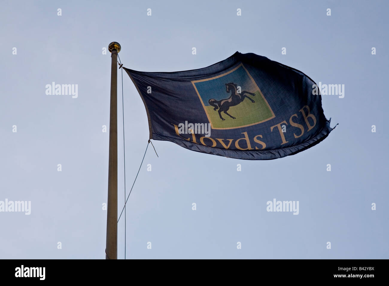 Lloyds TSB flag atop bank branch in City of London Stock Photo