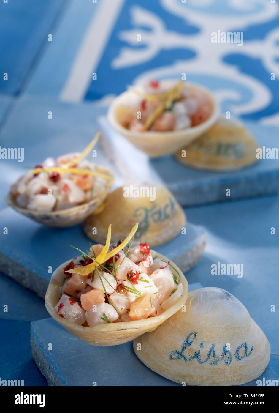 Fish tartare with dill and pink peppercorns Stock Photo - Alamy