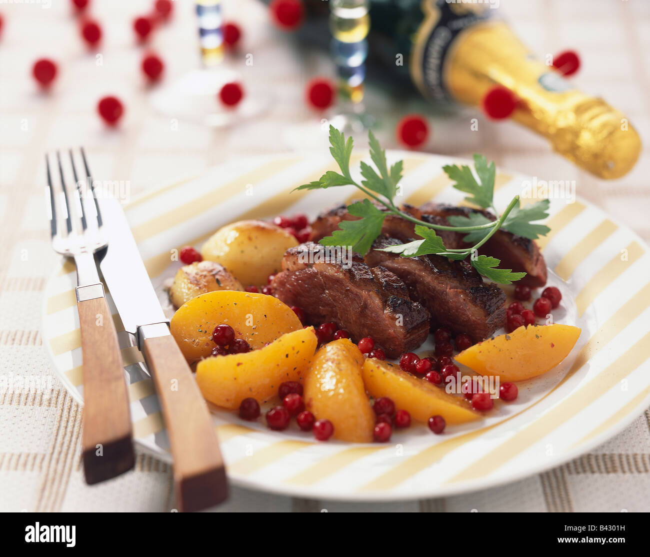 Duck fillet with peaches Stock Photo - Alamy