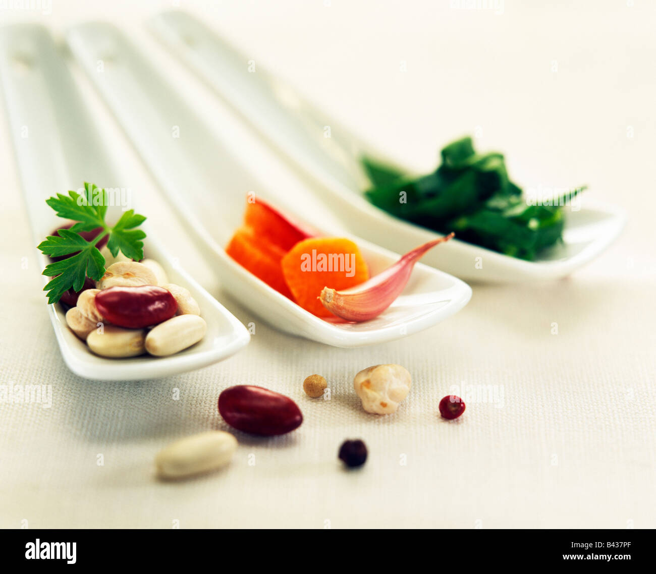 Spoons of vegetables Stock Photo