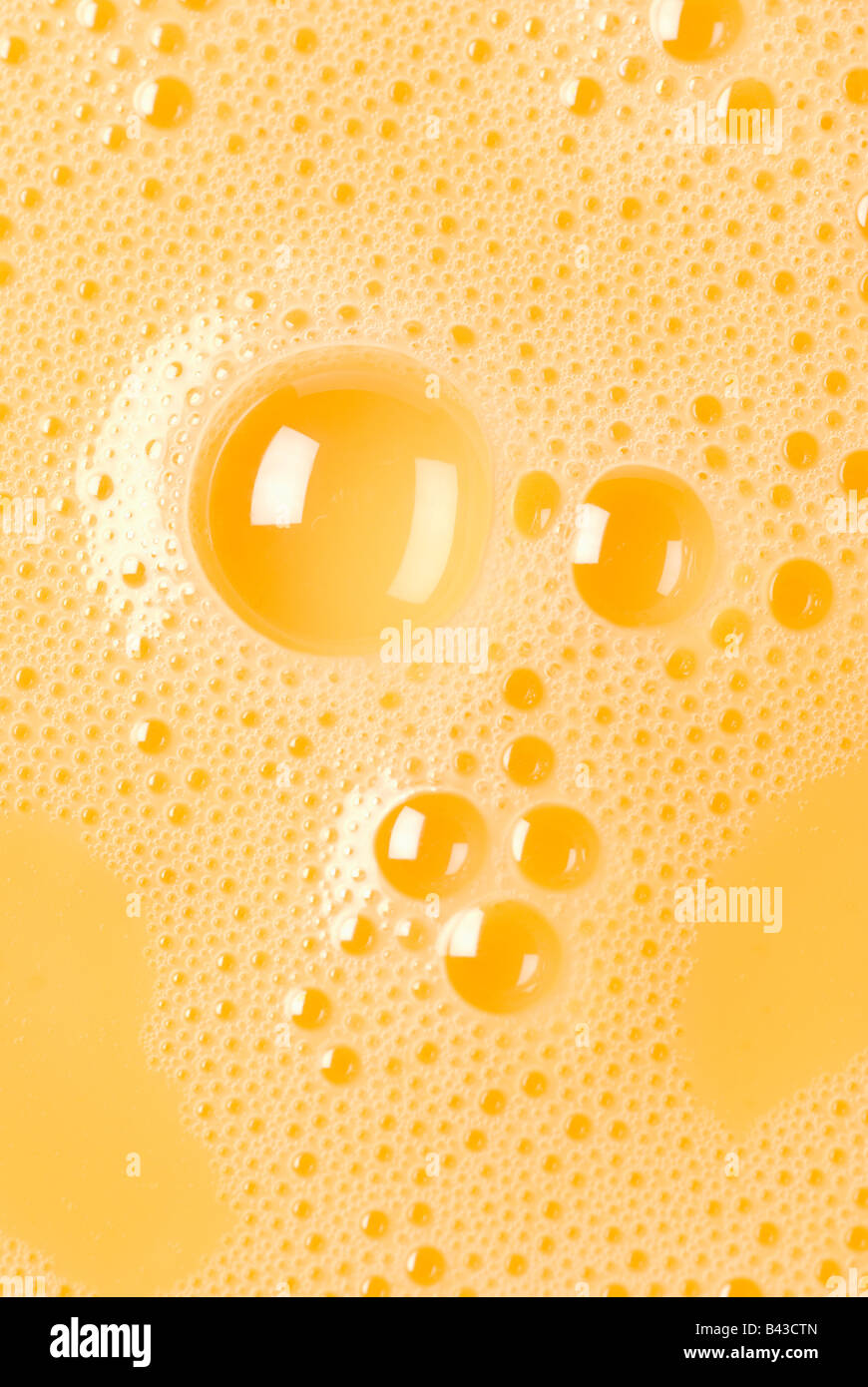 Close-up of beaten egg yolks with bubbles Stock Photo