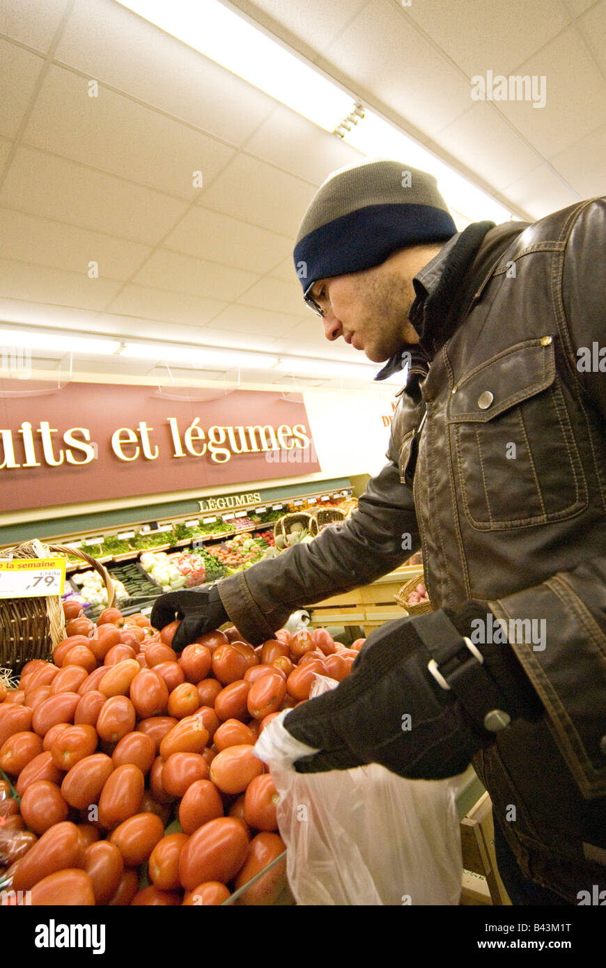 Man shopping for vegetables Stock Photo