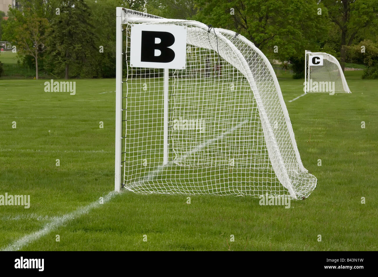 Soccer nets on outdoor grass field Stock Photo Alamy