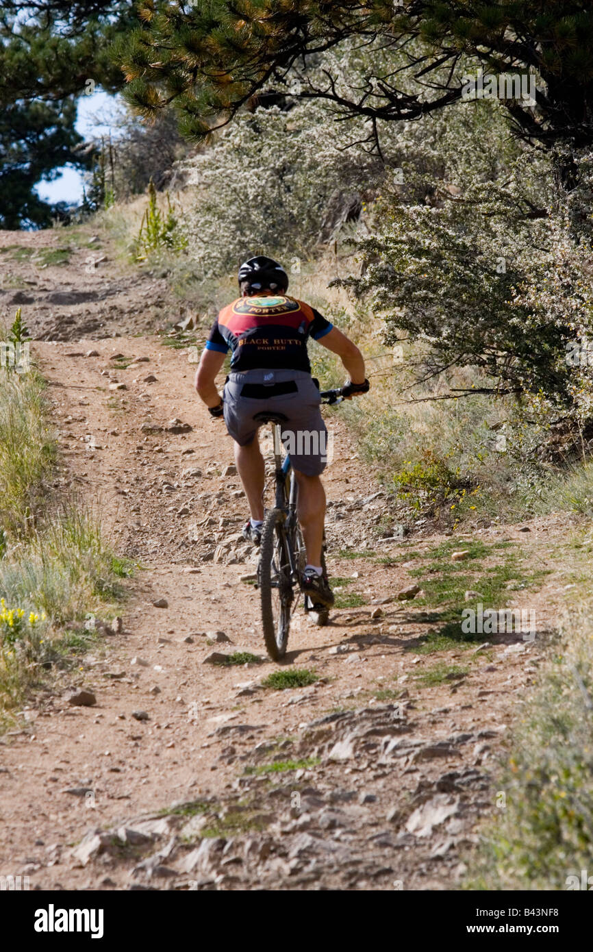 Mountain biker rides the rugged trails of White Ranch Park near Golden