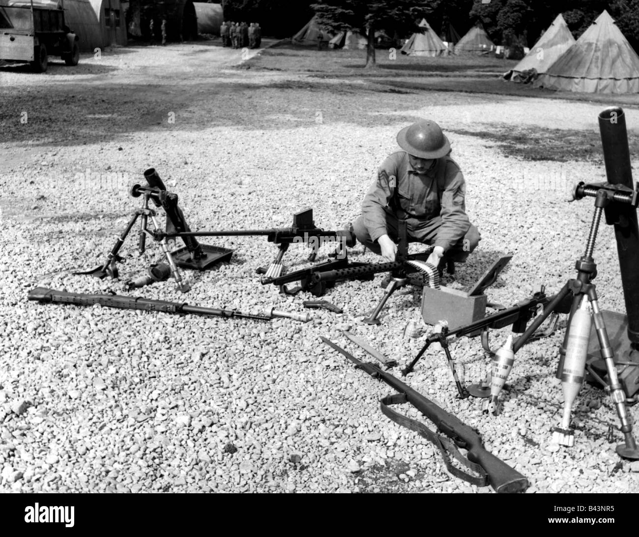 events, Second World War / WWII, Great Britain, training of US soldiers in Achnacarry, Scotland, US ranger with several British and American arms, August 1942, Stock Photo
