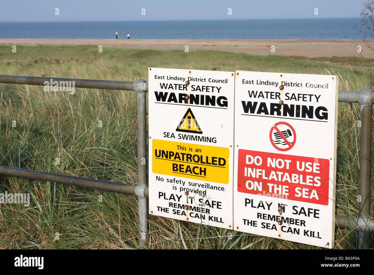 Safety warning signs on a beach in Lincolnshire, England, U.K. Stock Photo