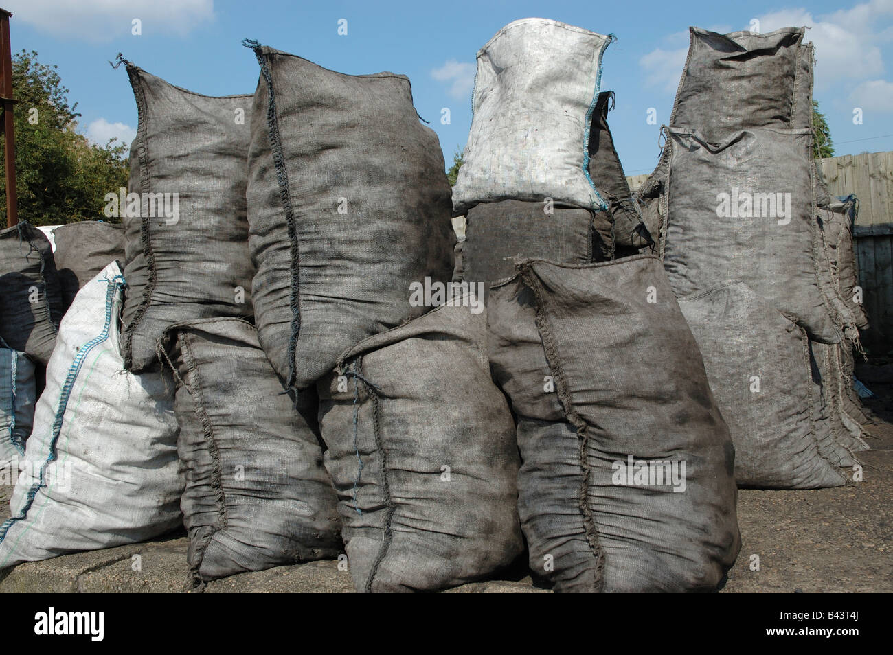 Coal bags awaiting delivery Stock Photo Alamy