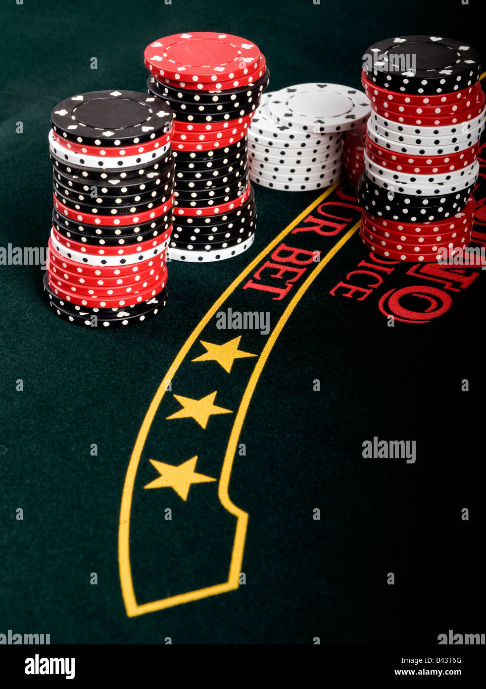 Poker chips on a Gaming Table Stock Photo