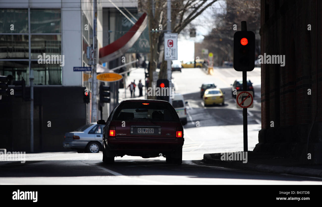 Car stopped at red traffic lights Stock Photo Alamy