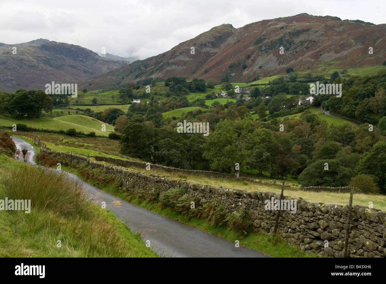 Quiet country lane in Little Langdale at the foot of Lingmoor Fell, Lake Dsitrict, Cumbria Stock Photo