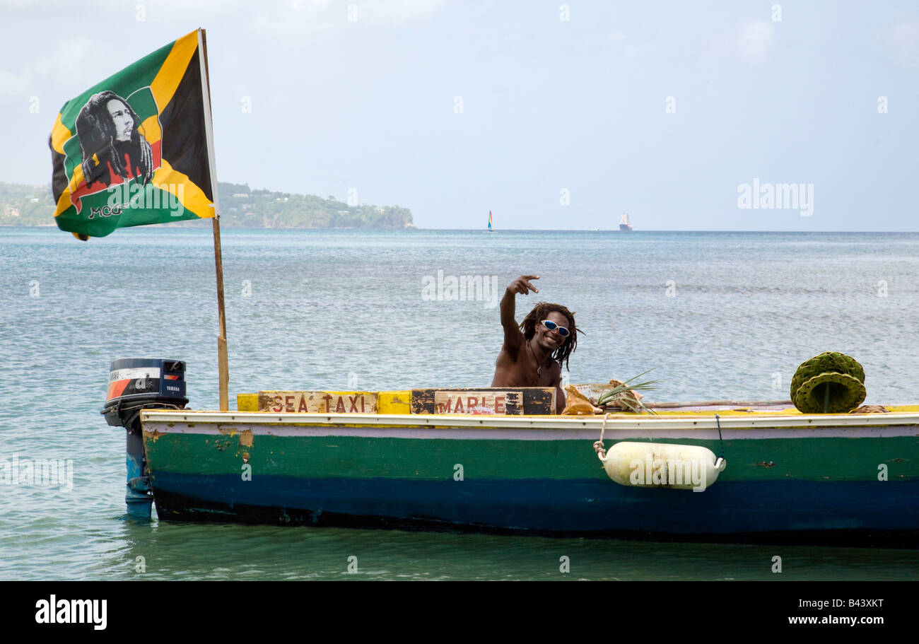 The local rastafarian water taxi, Windjammer Bay, St Lucia, West Indies Stock Photo