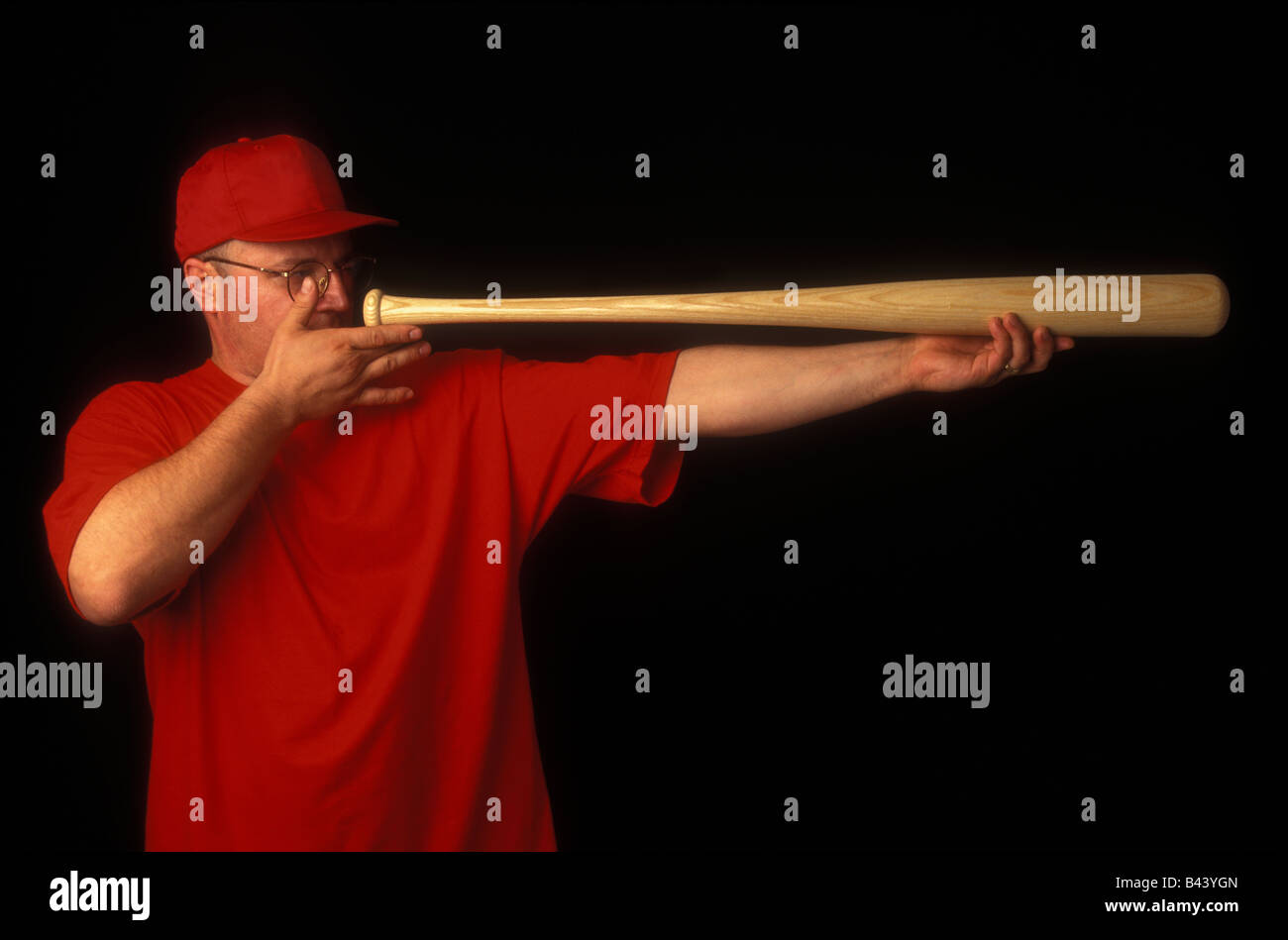 Testing Baseball Bat Worker inspecting baseball bat Stock Photo - Alamy