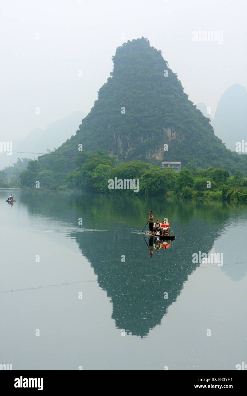 People on a raft on the Li River at Yangshuo,Guangxi Province, China Stock Photo