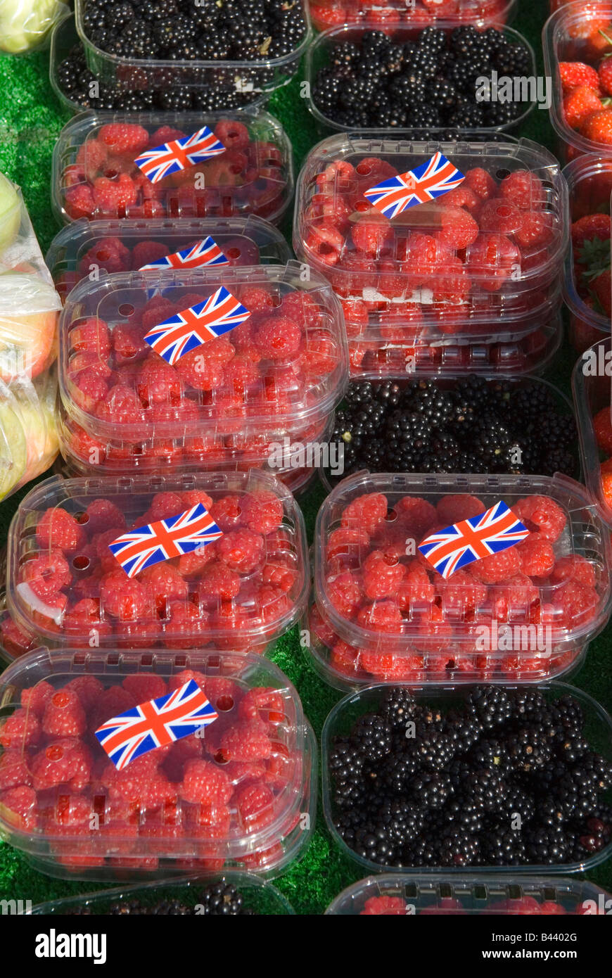 British Raspberries with Union Jack sticker displayed on market stall Blackheath Farmers Market South East London UK 2008 Stock Photo