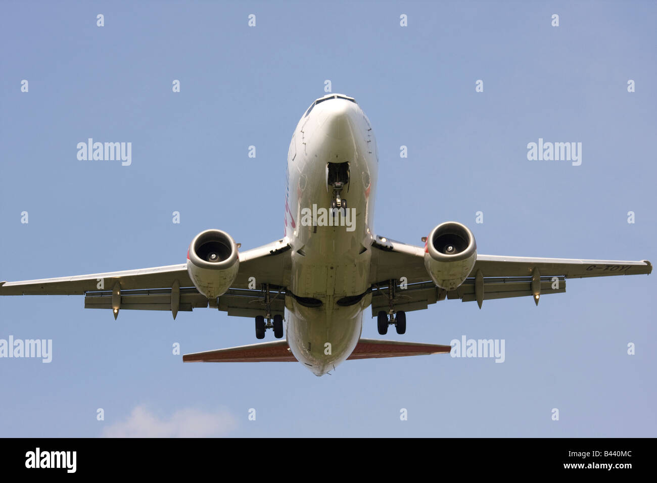 twin engine jet on approach to land Stock Photo Alamy