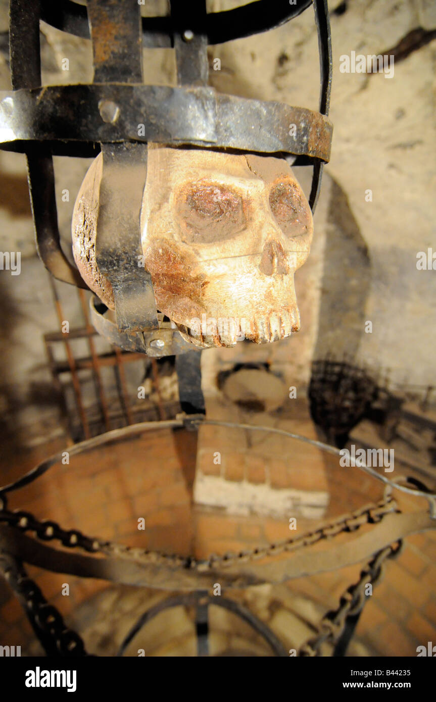 A skull on display in the torture room and dungeon in the Dalibor Tower, in the Prague Castle compound, in Czech Republic. Stock Photo