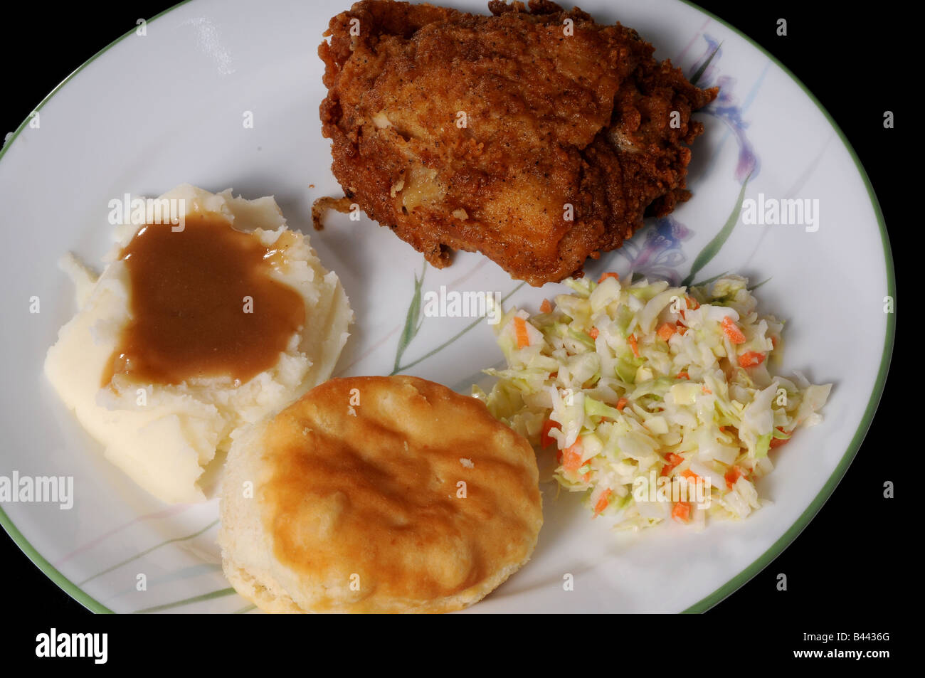 Chicken mashed potatoes cole slaw and a biscuit Stock Photo