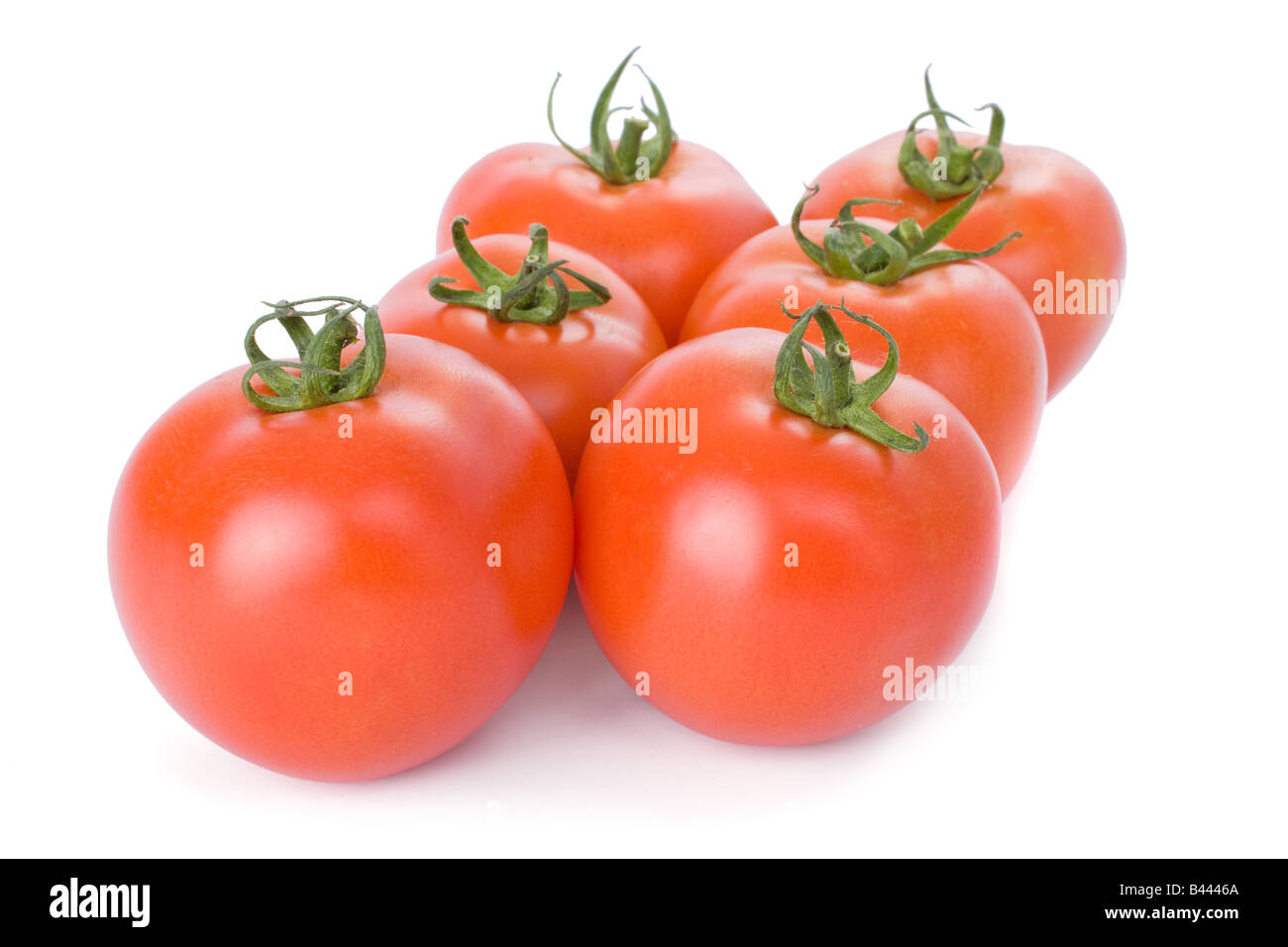 Ripe tomatoes isolated on a white background Stock Photo - Alamy