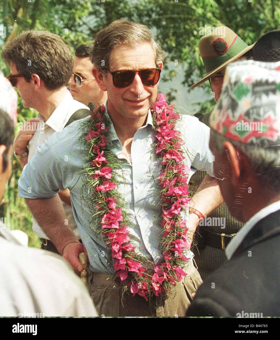 Prince Charles speaks to locals in Himalayas during visit to Nepal February 1998 Stock Photo