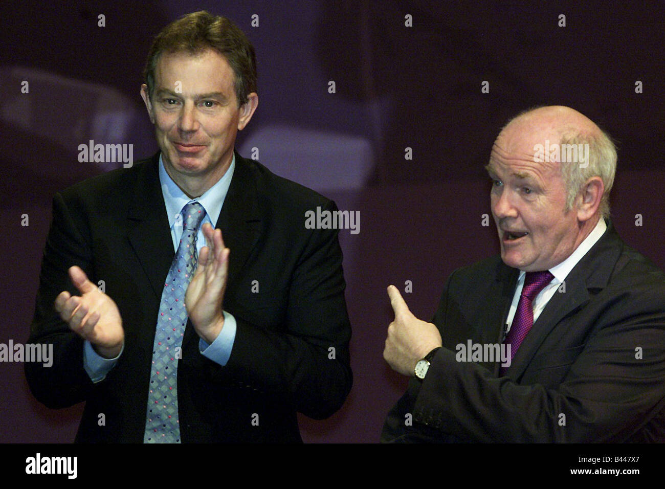 Labour Party Conference October 2002 Blackpool Dr John Reid MP Northern  Ireland Minister receives applause from Tony Blair PM Stock Photo - Alamy