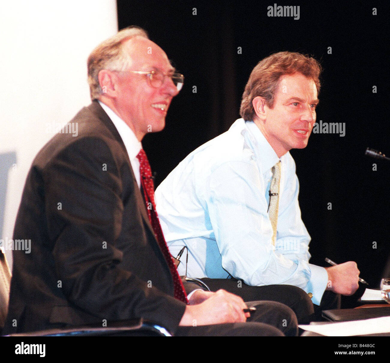 Tony Blair Prime Minister March 2000 and Donald Dewar MP answering questions in Kilsyth Academy Stock Photo