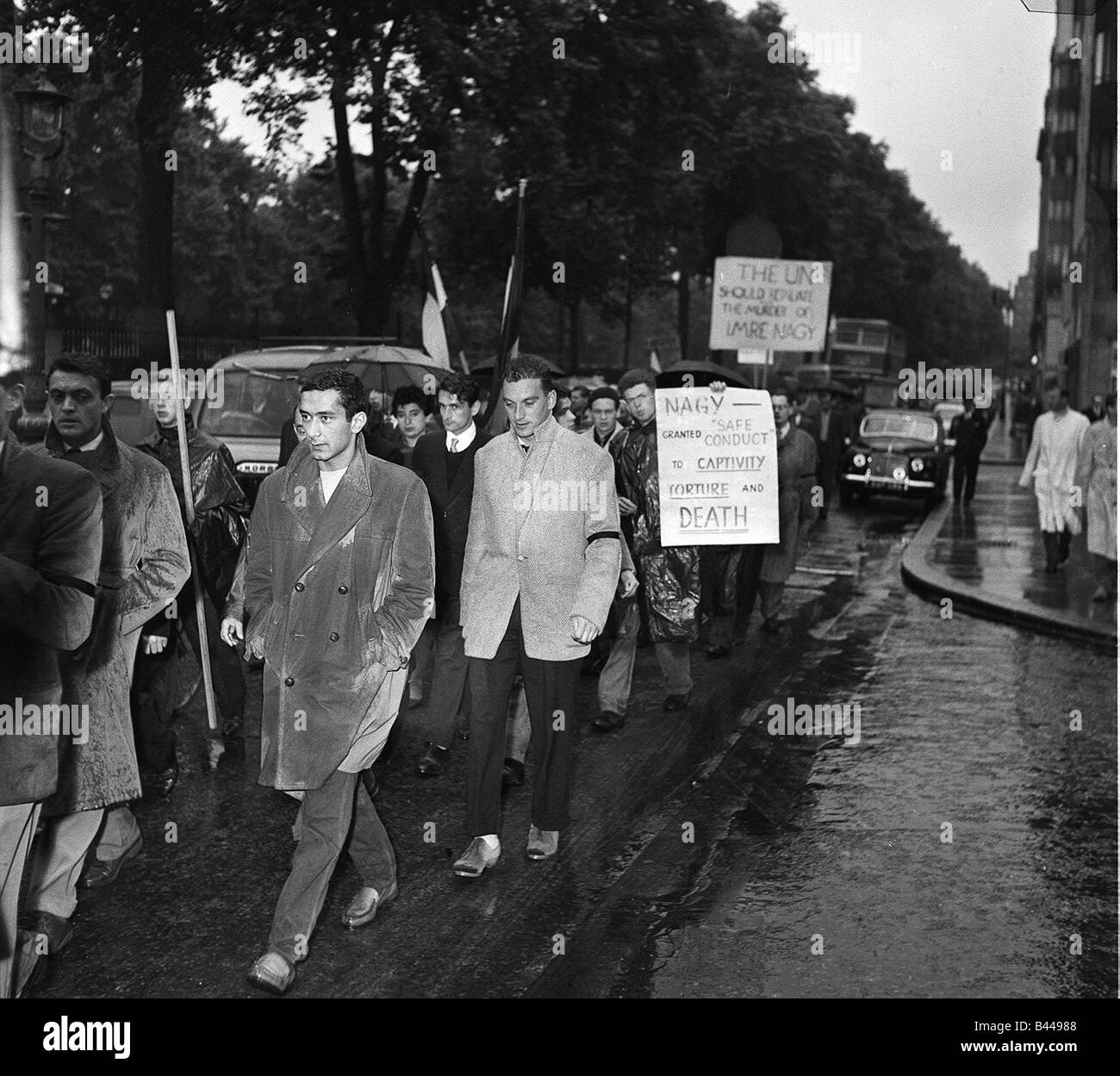 Hungarian students from London University marching along Park Lane on route to Belgrave square to lodge a protest Stock Photo