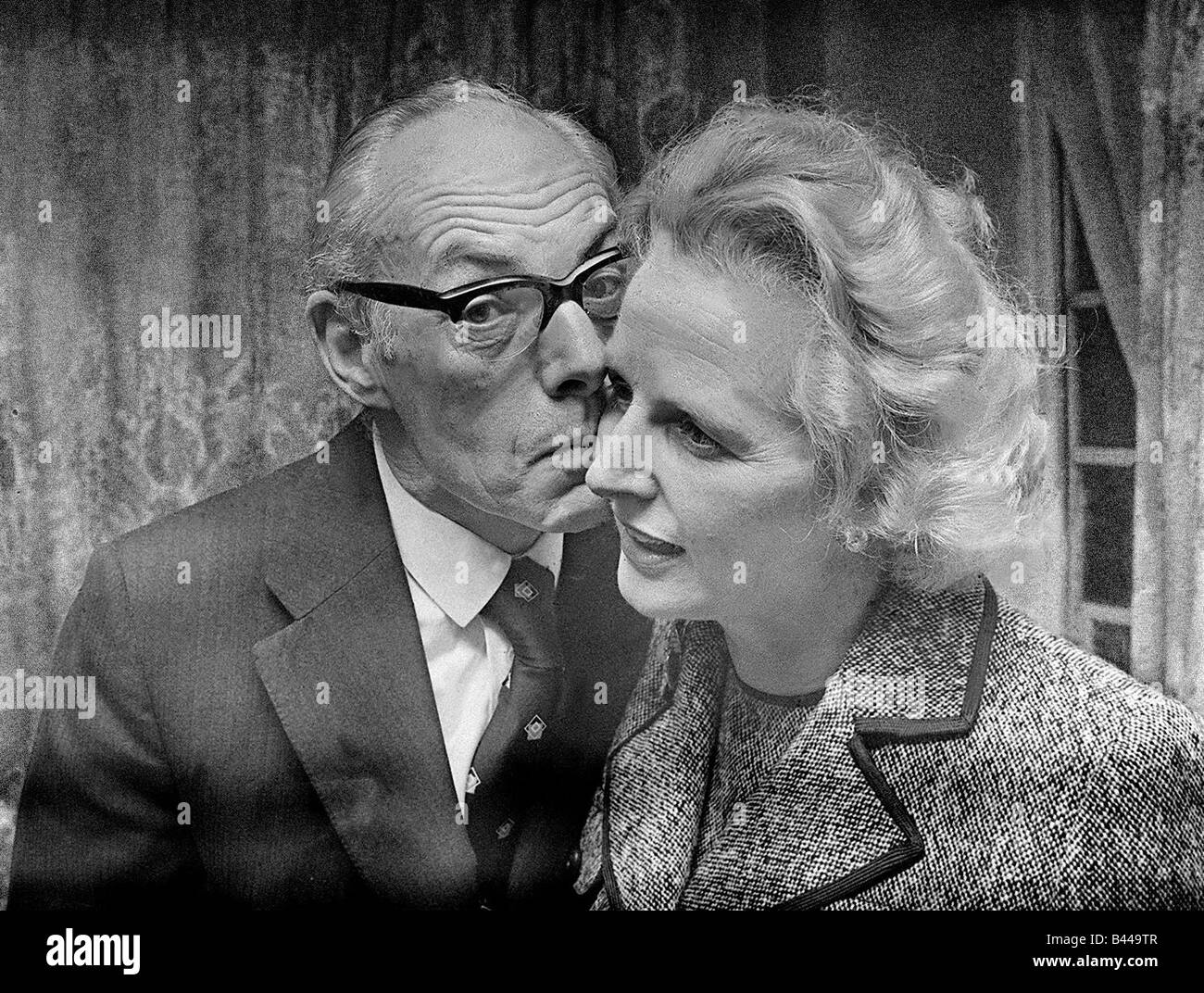 Margaret Thatcher with Denis Thatcher who kisses her on the cheek February 1975 Stock Photo