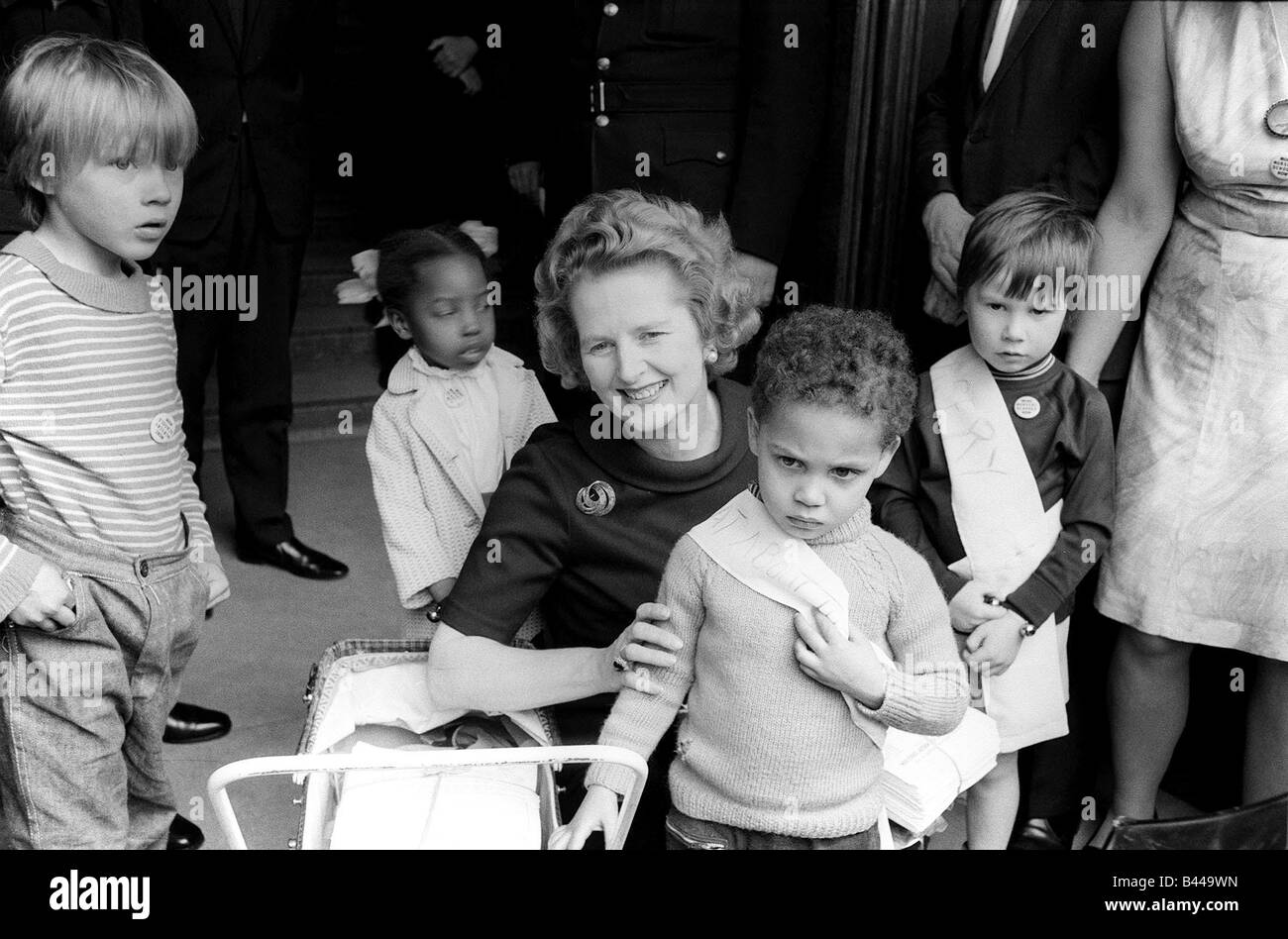 Minister of Eductaion Maggie Thatcher with young children May 1972 Stock Photo