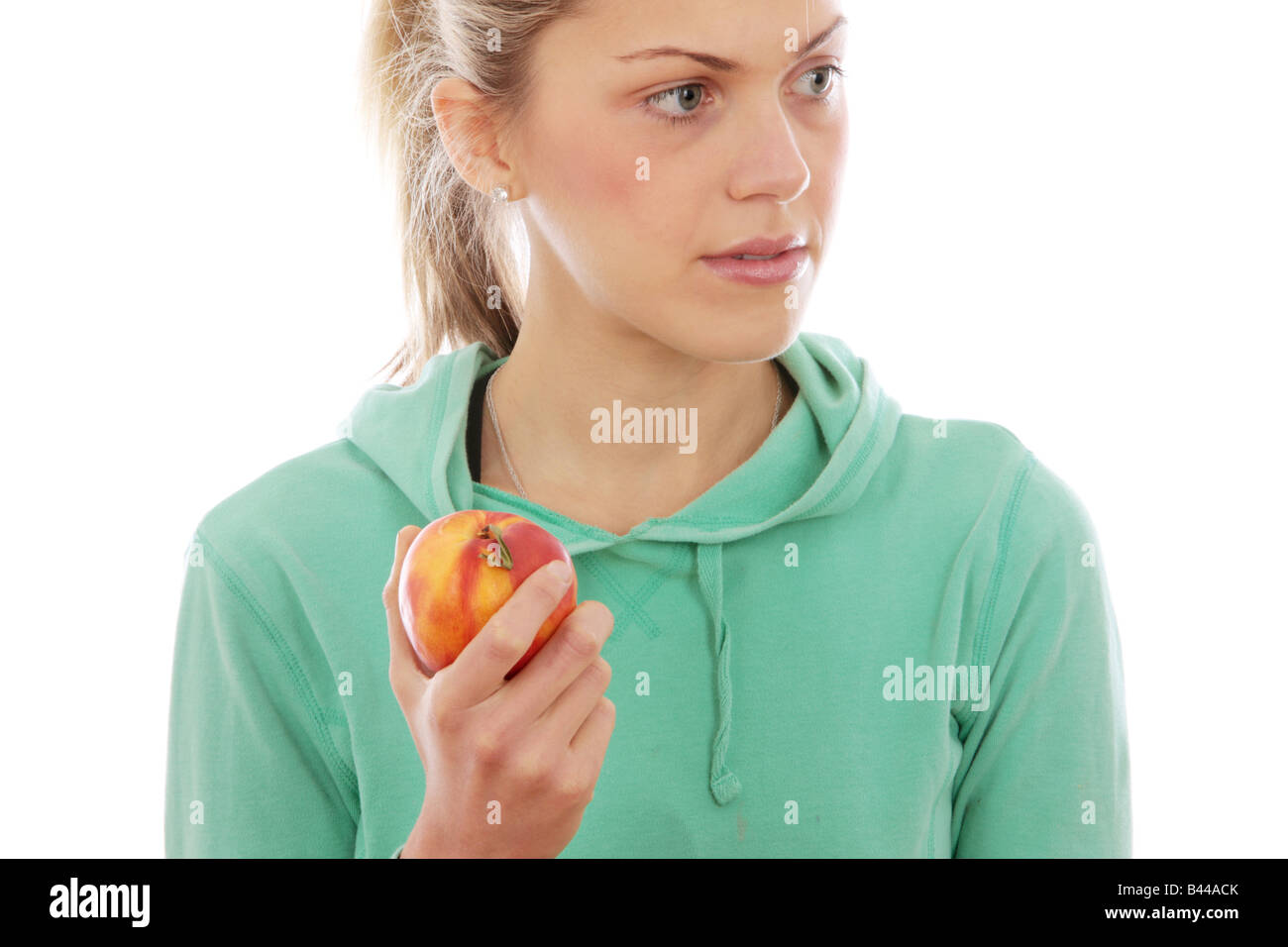 Young Woman Holding Nectarine Model Released Stock Photo Alamy