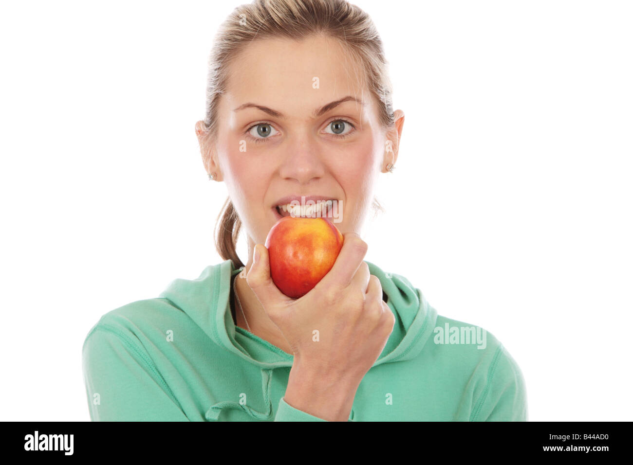 Young Woman Eating Nectarine Model Released Stock Photo Alamy