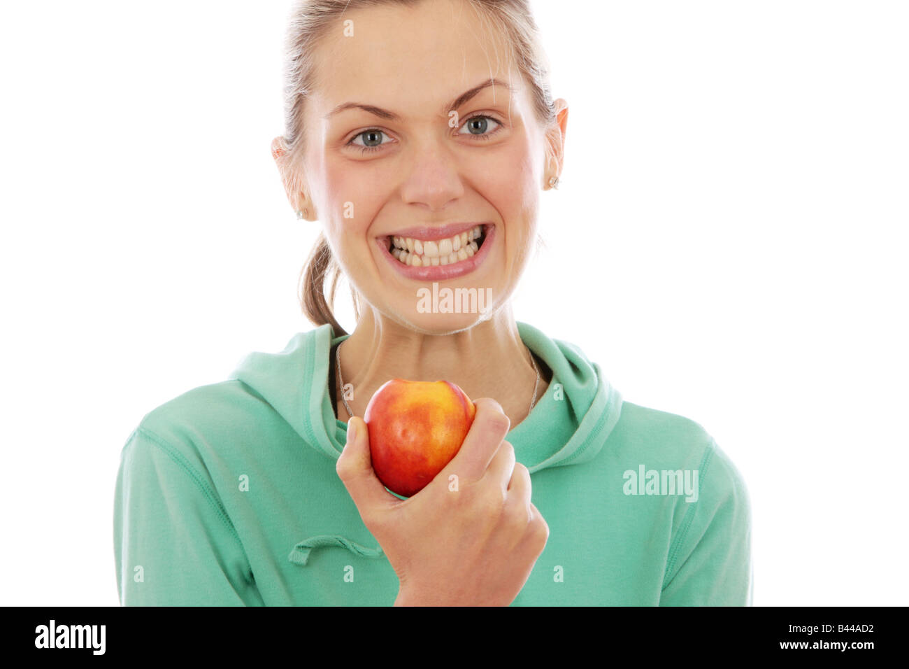 Young Woman Holding Nectarine Model Released Stock Photo Alamy