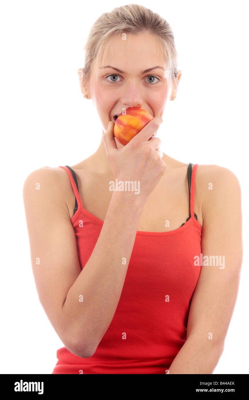 Young Woman Eating Nectarine Model Released Stock Photo Alamy
