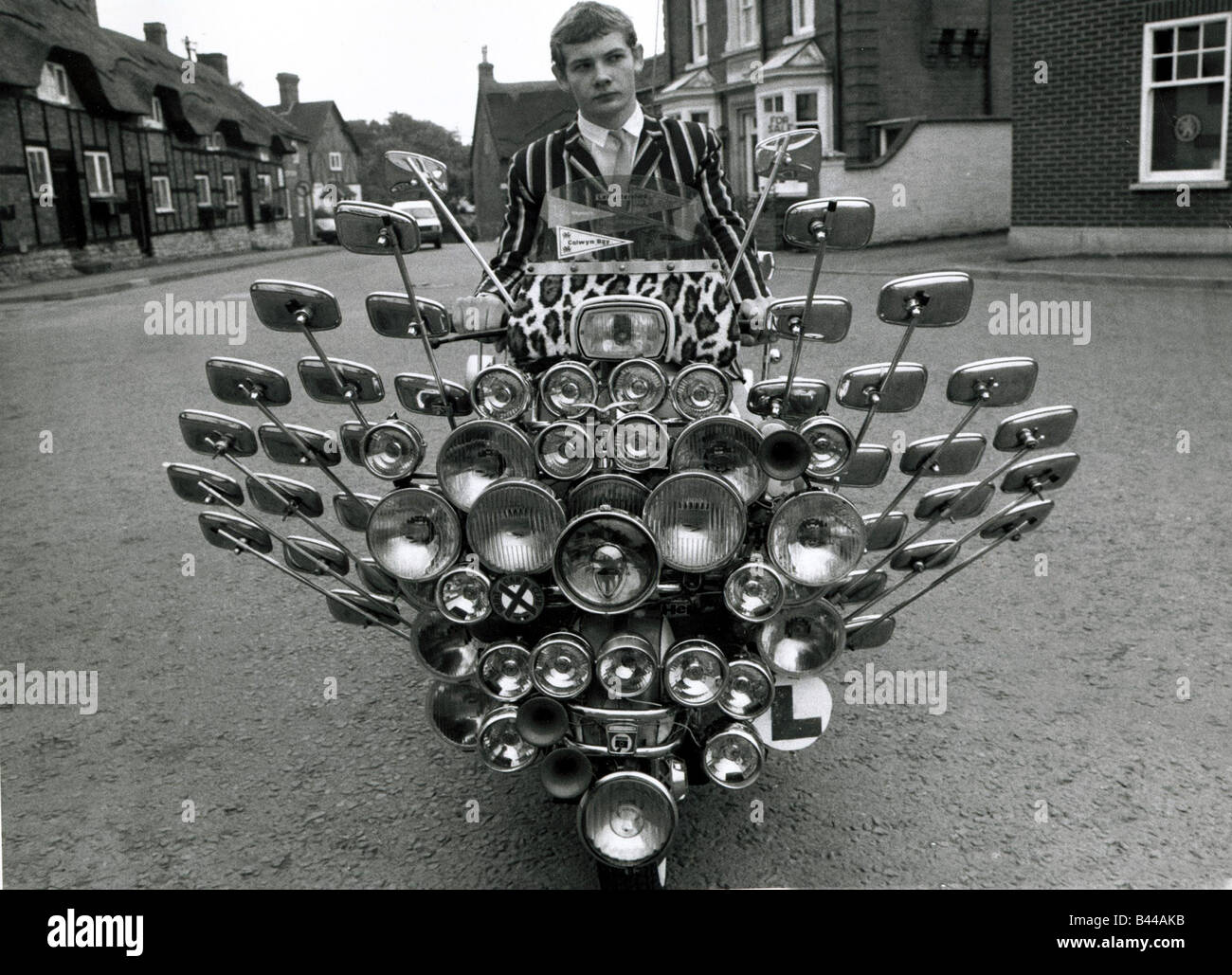 School leaver Bryn Owen aged 17 with his Vespa scooter at Market Bosworth July 1983 Stock Photo