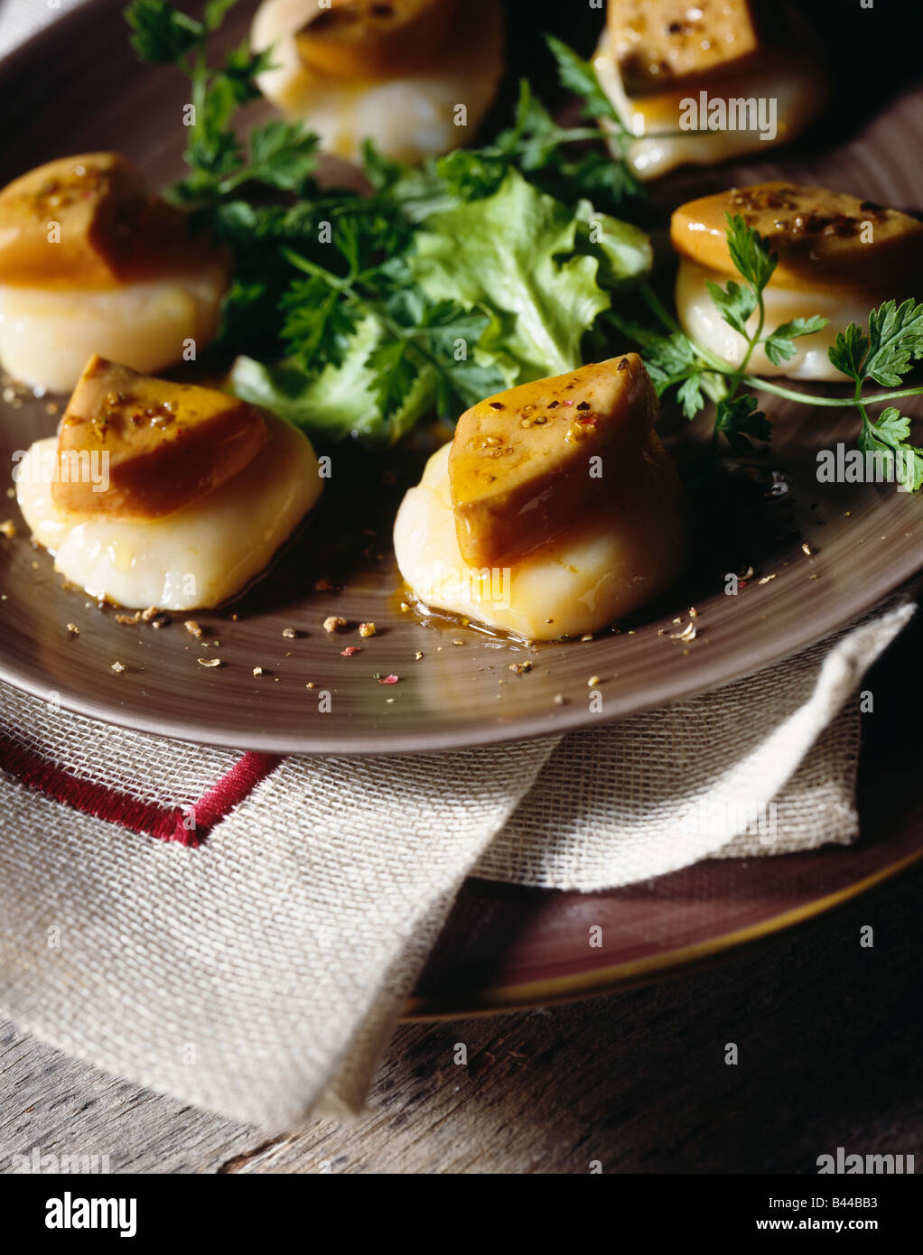 Duck foie gras on scallops Rossinistyle Stock Photo Alamy