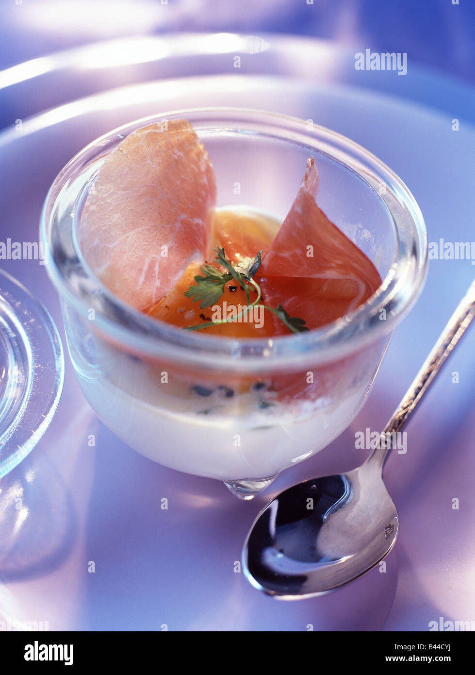 baked egg and parma ham Stock Photo Alamy