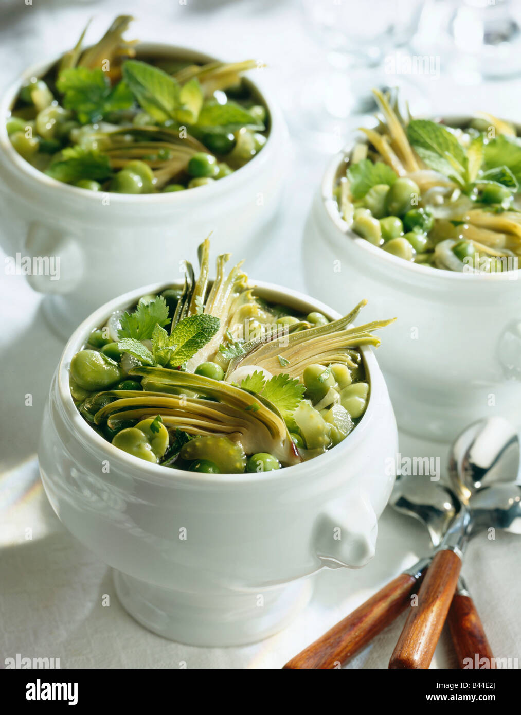 Broad bean and artichoke soup Stock Photo Alamy