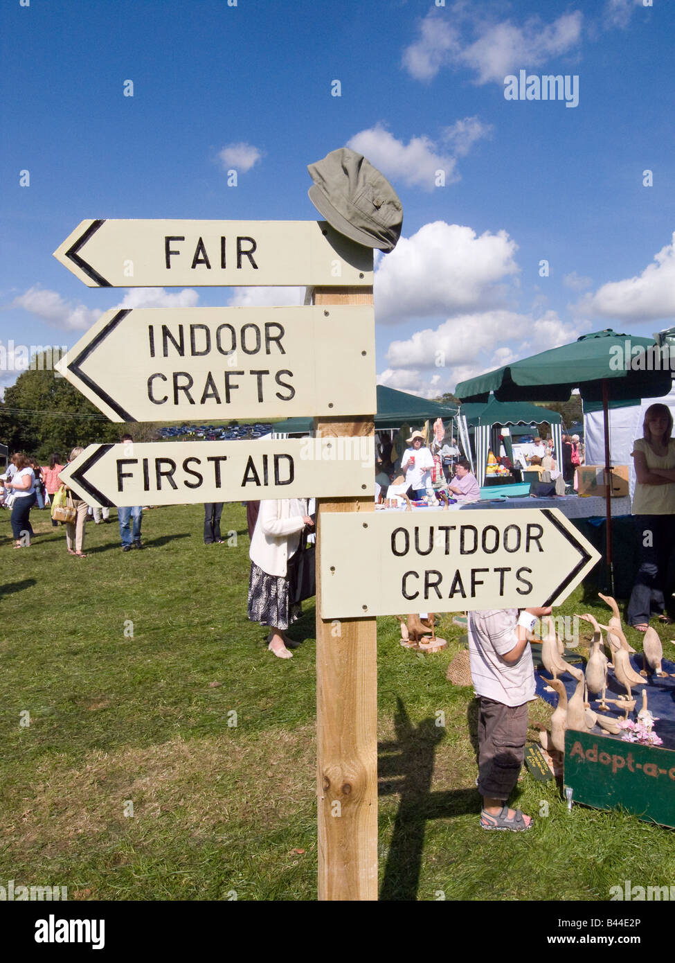 Signpost pointing out the various attractions at Findon Sheep Fair, Findon Village, West Sussex, England, UK Stock Photo