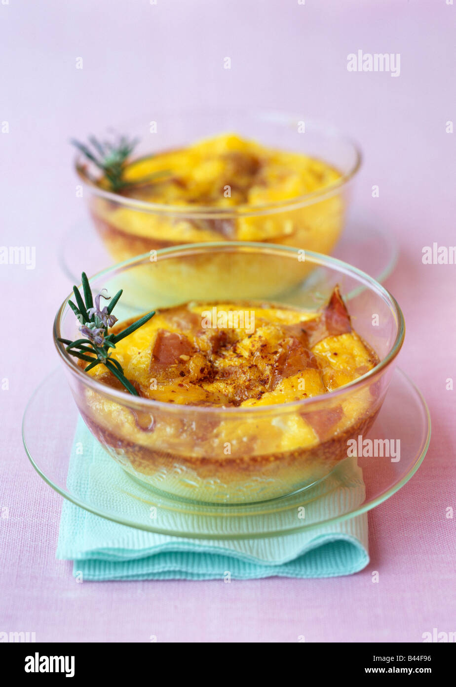 Serrano ham and Espelette pepper baked flans Stock Photo