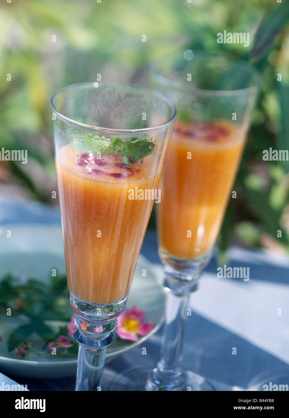 melon juice with vodka and blackcurrant liqueur Stock Photo Alamy