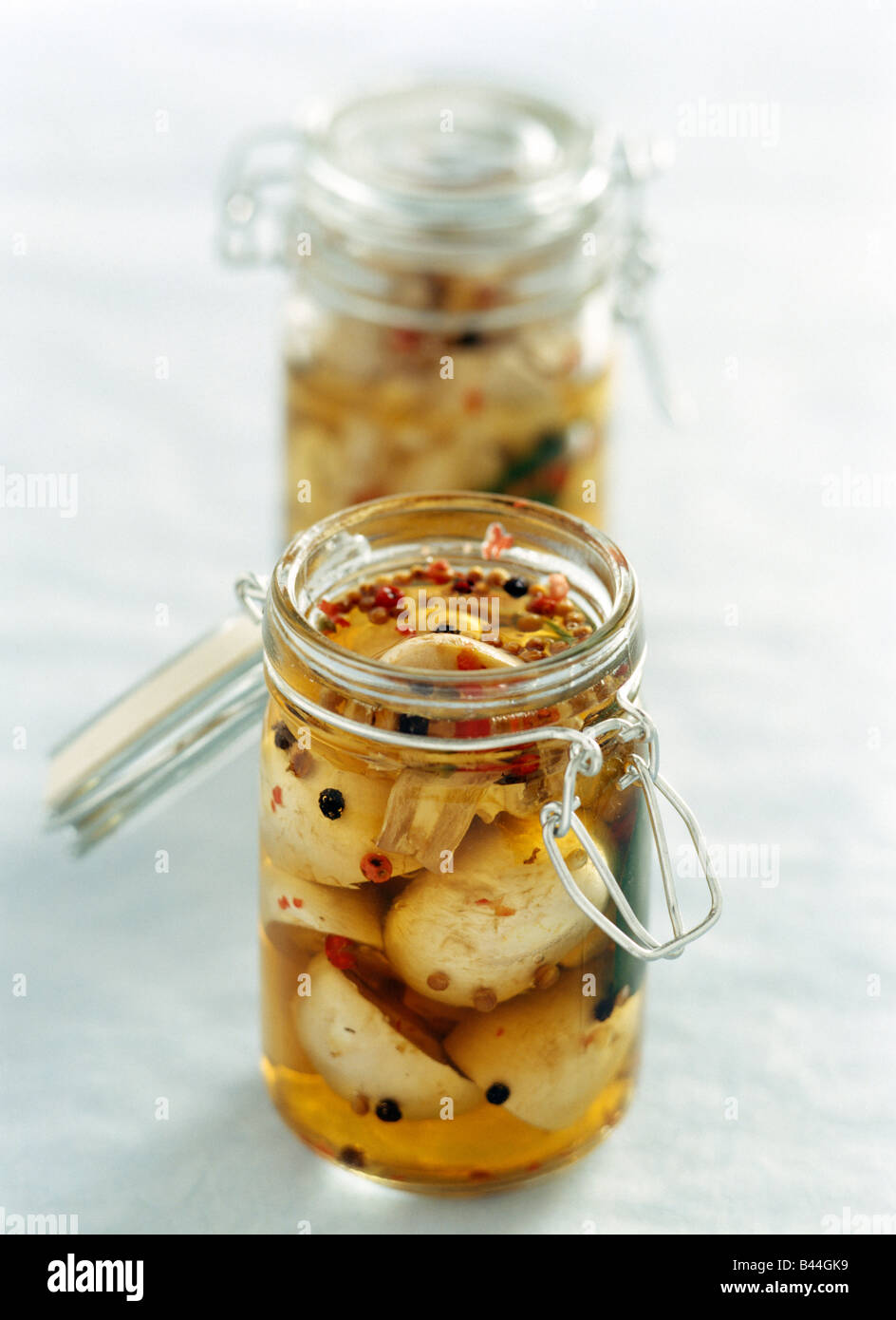 mushrooms in vinegar Stock Photo Alamy