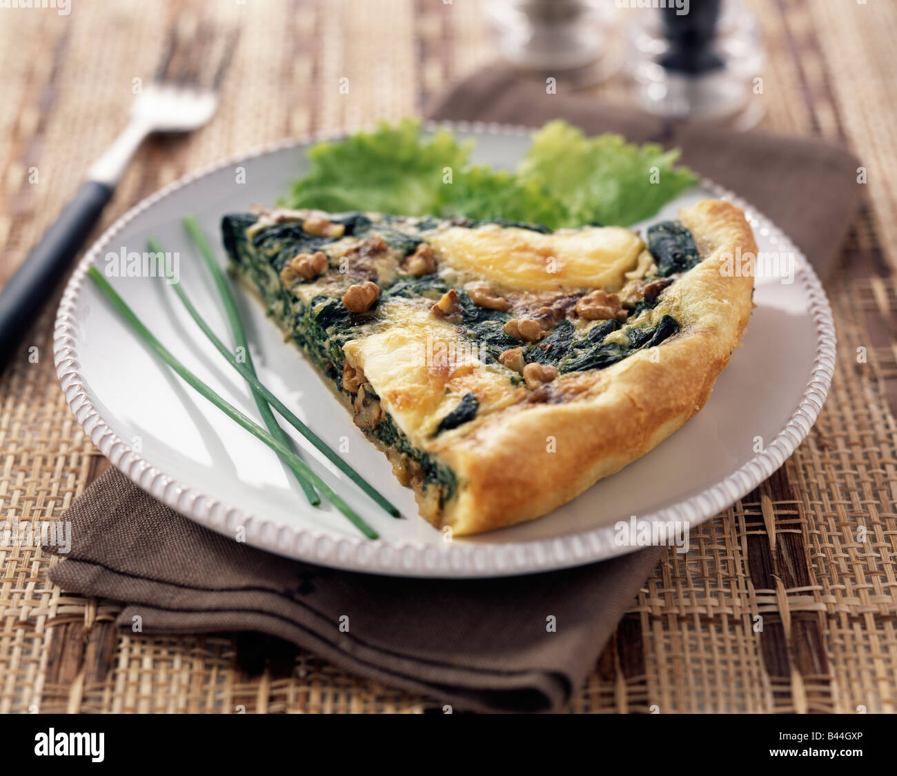 Spinach and goat's cheese savoury tart Stock Photo Alamy