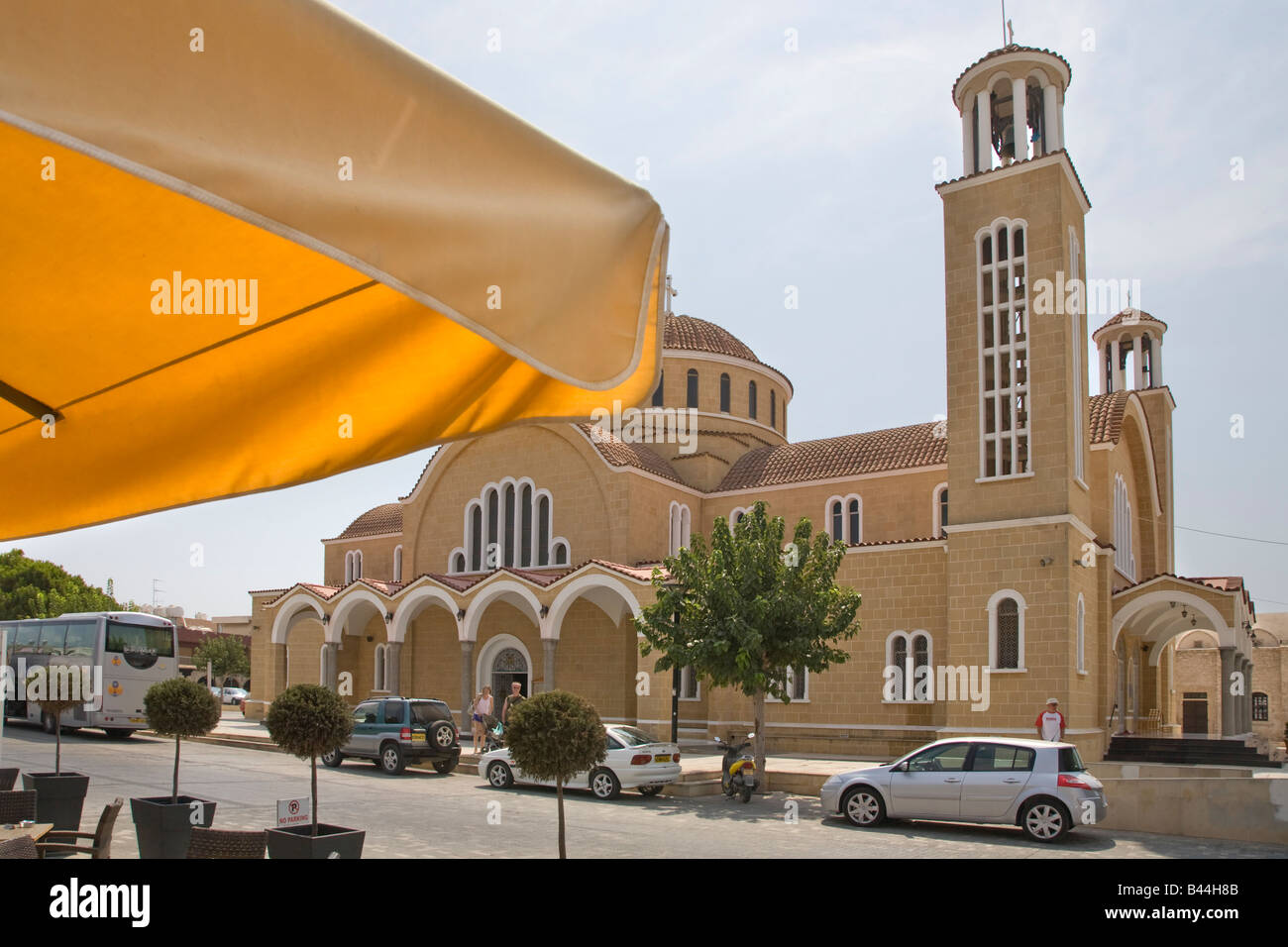 The newer St George Church at Paralimni Cyprus VIEWED FROM A CAFE ACROSS THE ROAD Stock Photo