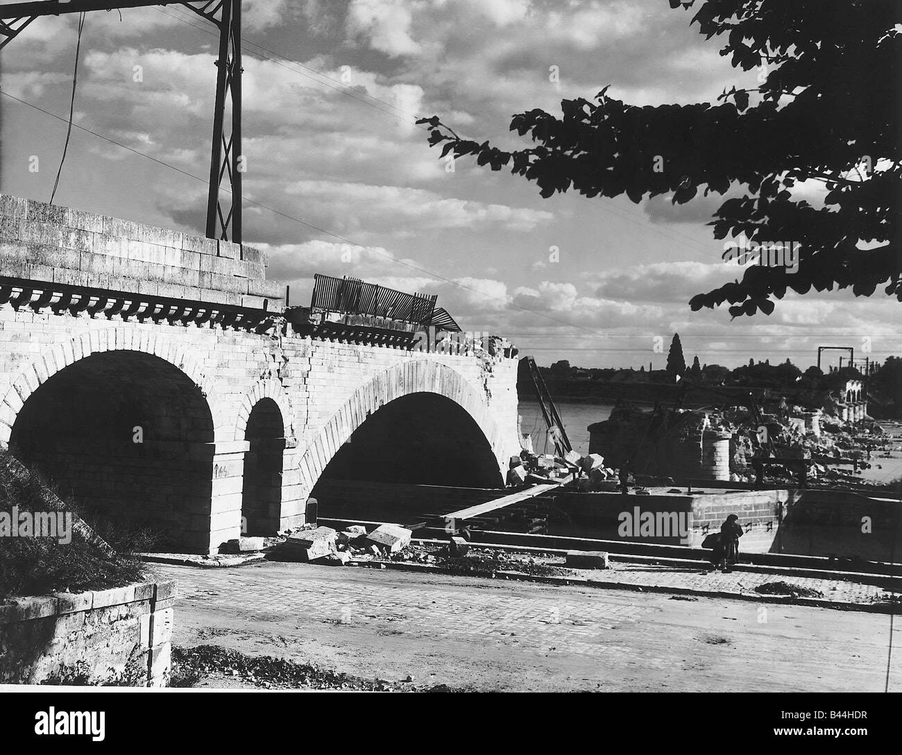 Railway bridge at Orleans Loire damaged in air raid 10 of its 14 spans were demolished by the bombing and the only casualty Stock Photo