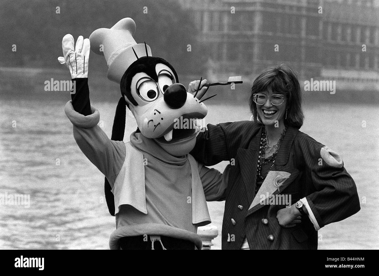 Janet Street Porter with Goofy on River Thames 1983 Stock Photo