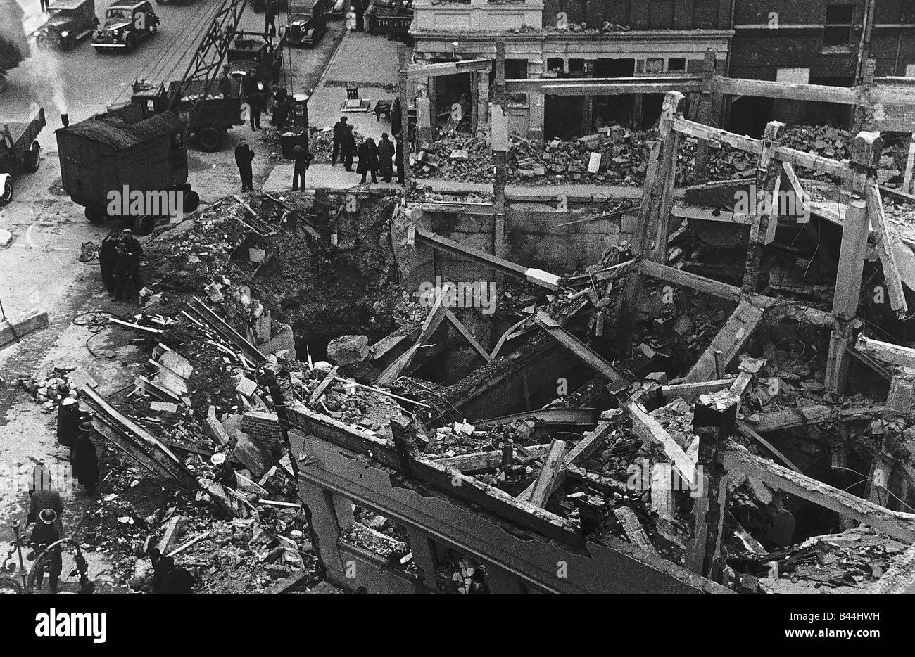 Workmen and rescue services work on the remains of Sloane Square Underground Station in London which was bombed during WW2 Stock Photo