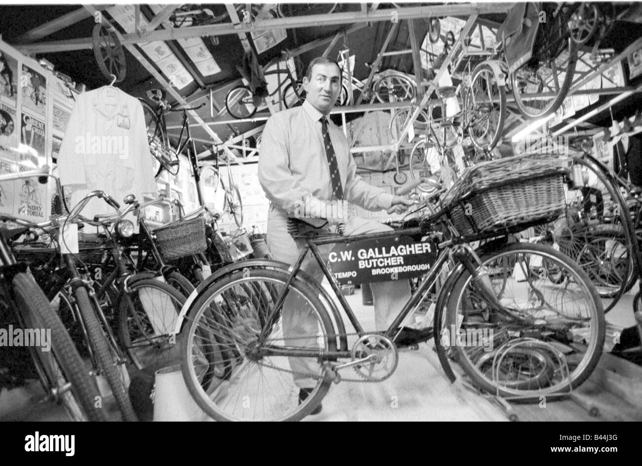 Robert Coalter curator and restorer of vintage bikes at the Brookeborough Vintage Cycle Museum circa 1970s Stock Photo