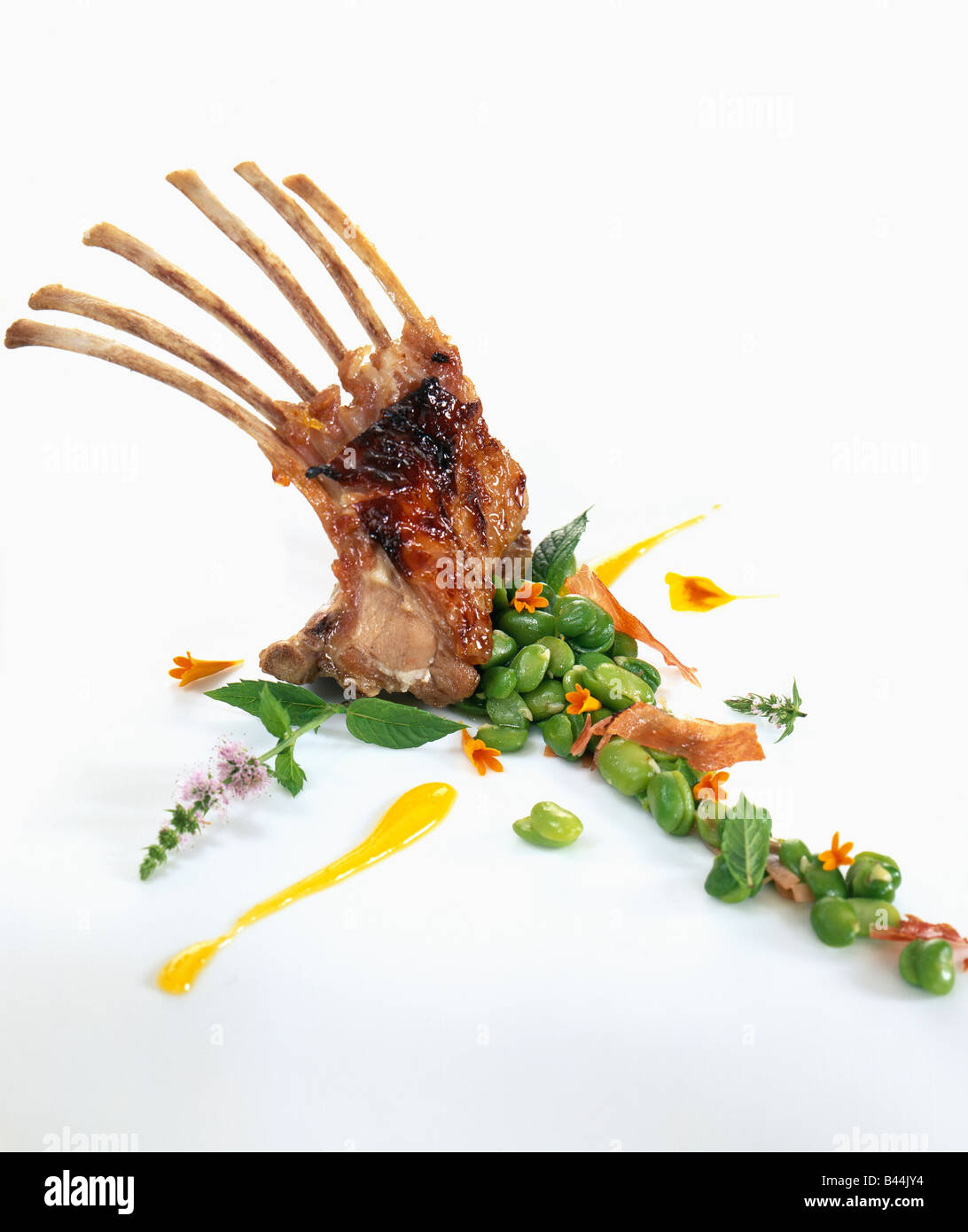 loin of young goat's chops with honey and orange Stock Photo Alamy